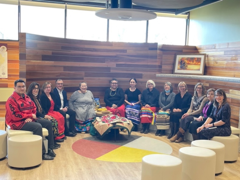 group of people at Indigenous Community Space Pipe Ceremony at the Faculty of Education