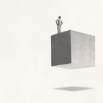 Conceptual illustration of a man standing on a floating cube.