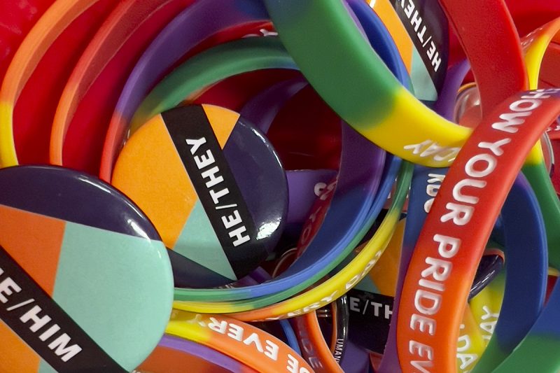 Pride bands and pronoun buttons
