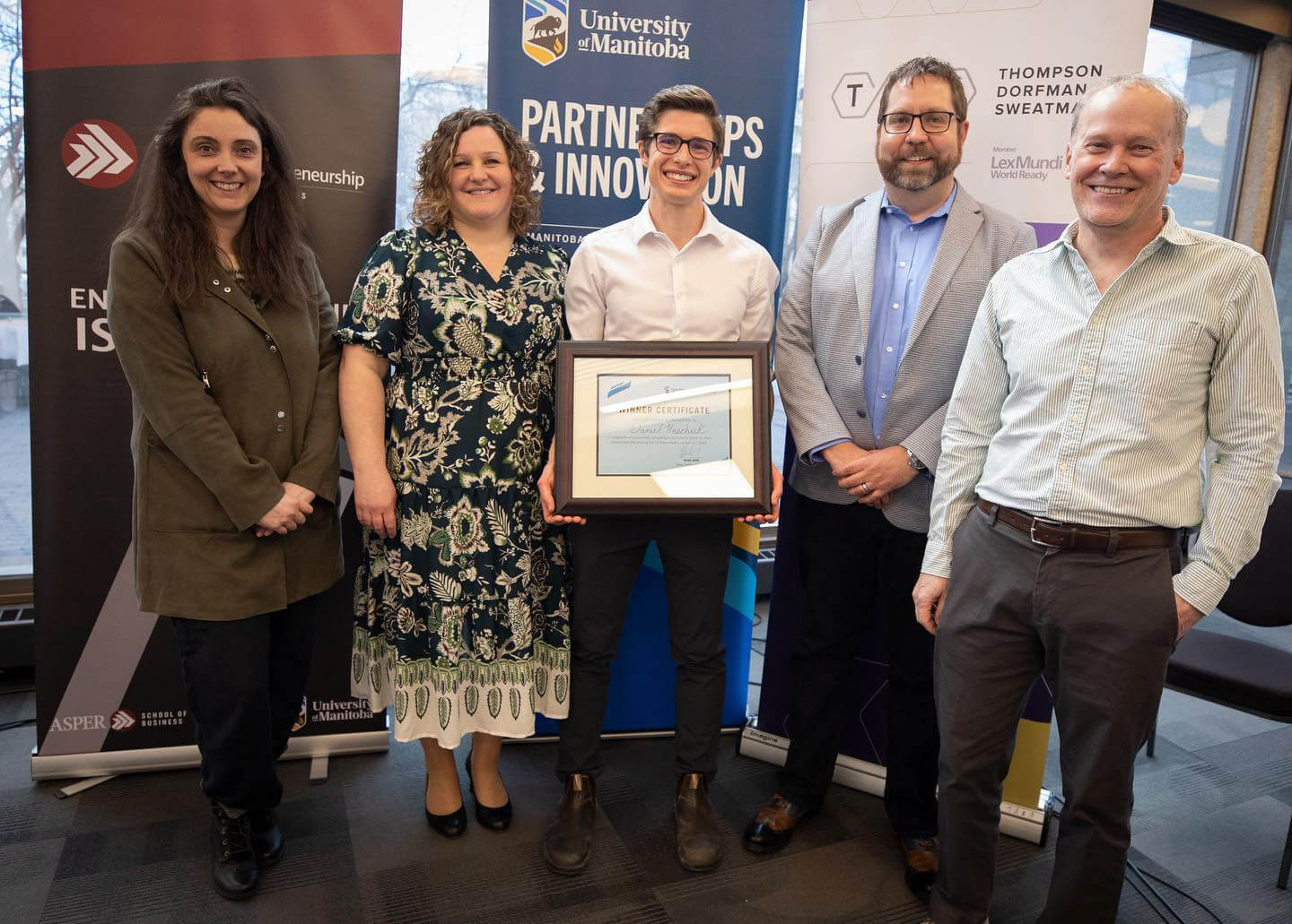 Science Spark 3K Pitch Competition winner Daniel Heschuk. From left to right: Dr. Jolen Galaugher, Janine Carmichael, Daniel Heschuk, Dr. Loren Oschipok, Dr. Steven Whyard.