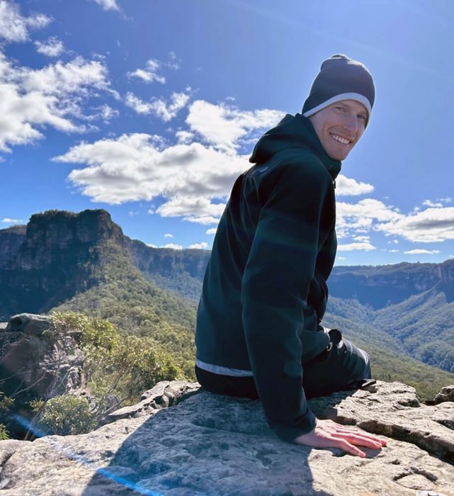 Dr Warren Blunt on a mountain