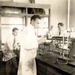 Louis Slotin (left) and fellow students, Harvey Cohen (centre) and Charles Alan Ayre (right) in chemistry lab at the University of Manitoba, ca. 1933-34.
