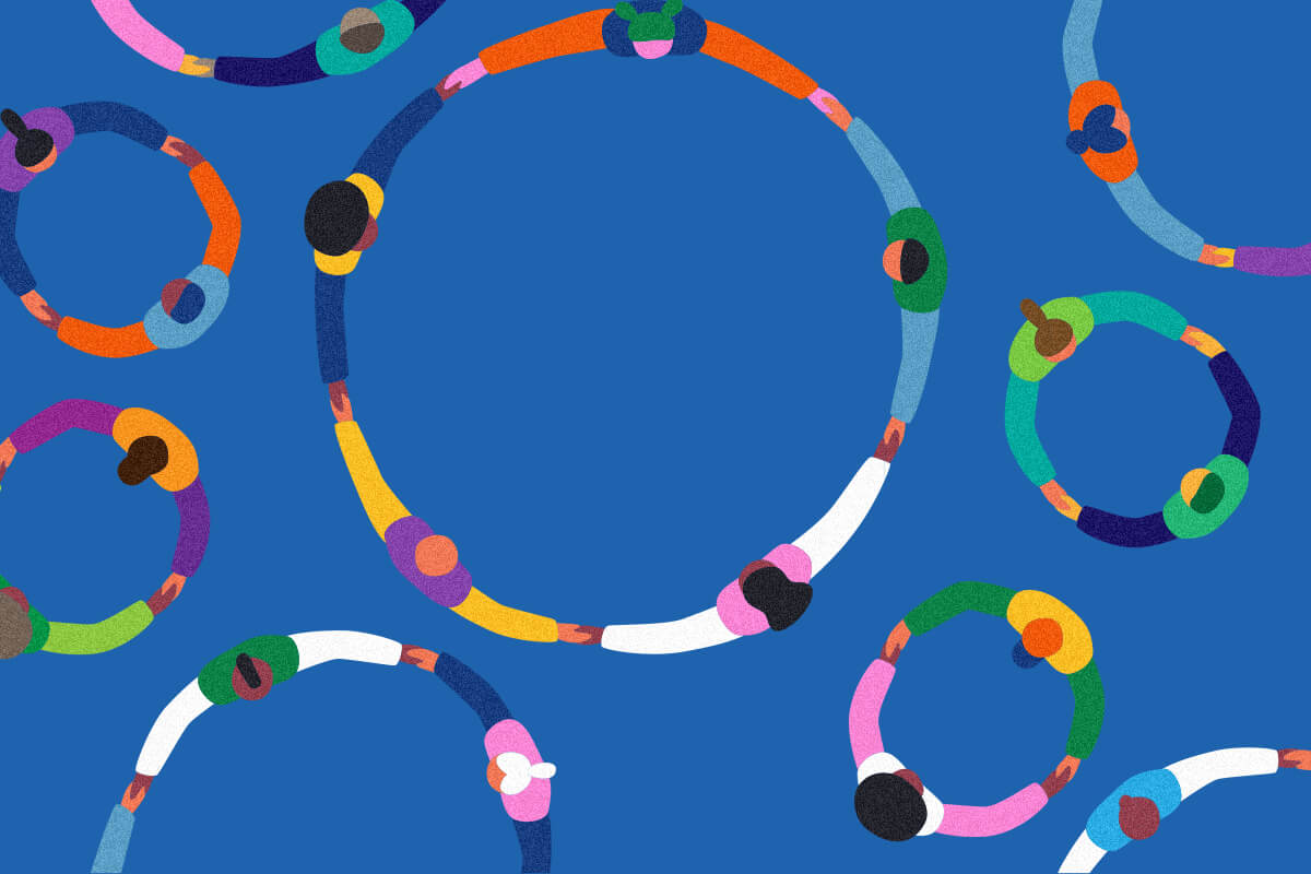 A group of abstract circles, upon closer look is images of people holding hands.