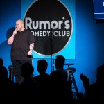 Law student Lou Lamari (3L) competes for the title of “Winnipeg’s Funniest Person with a Day Job” at Rumor’s Comedy Club.
