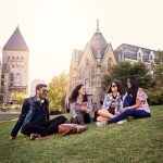 Student group sitting on "the beach" in front of Redpath Museum Valeria Lau | McGill University (April 2018)