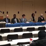 Clinical Instructor Andrea Doyle (far left) introduces the Faculty of Law’s Access to Justice Week event panel for the Access to Justice in French: A World to Discover event. Left to right: Moderator Honourable Judge Denis Guenette, Jean-René Dominique Kwilu, Tarik Daoudi, Ruphine Djuissi, Dr. Lorna Turnbull, and Keynote speaker Chief Justice of Manitoba, Marianne Rivoalen.
