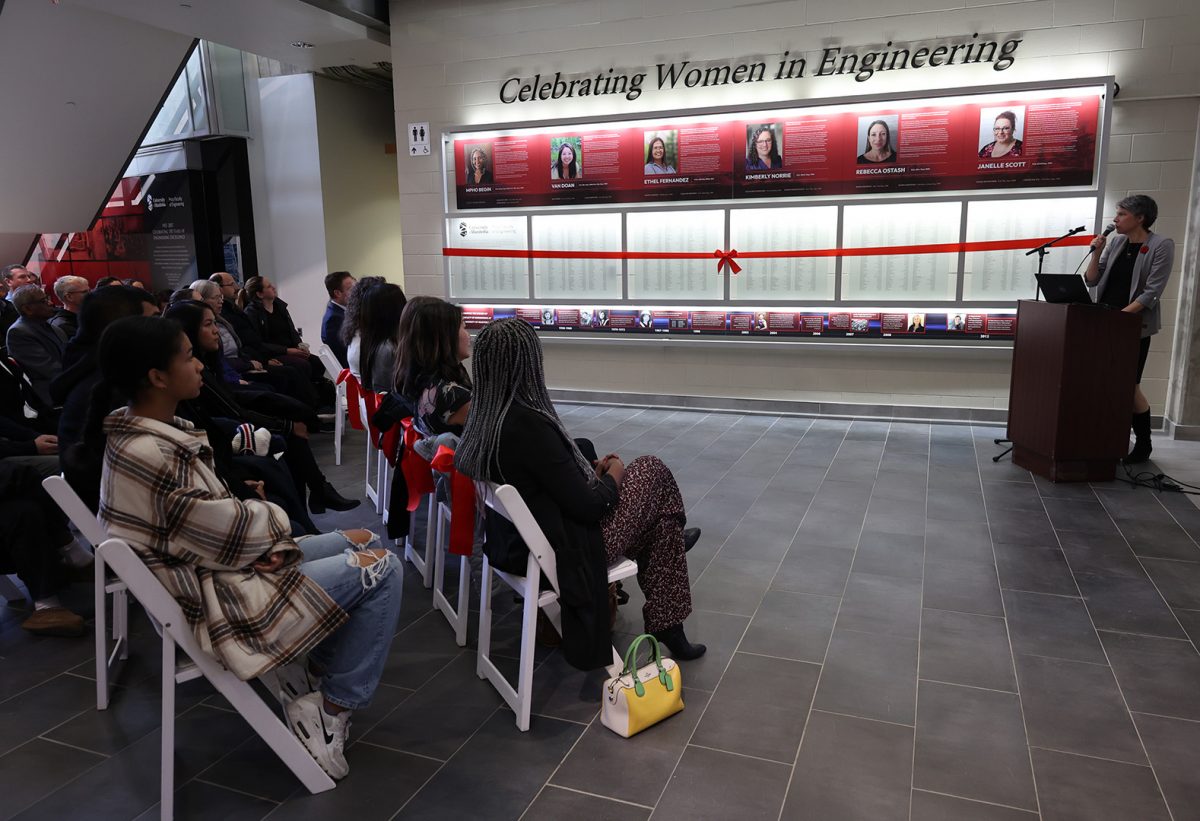 Dean Friesen speaking to crowd at Celebrating Women in Engineering Wall