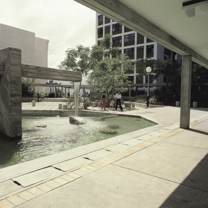 Image of outdoor courtyard with waterfall feature.