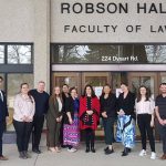 The Honourable Michelle O'Bonsawin, Justice of the Supreme Court of Canada with law students in front of Robson Hall, Faculty of Law building.