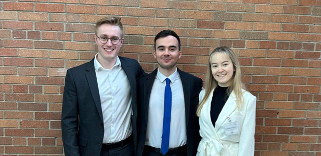 Photo of three law students left to right Justin Papoff, Matthew London, Megan Simpson