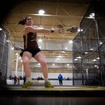 Anna McConnell mid throw during a weight throw competition