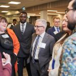 President and Vice-Chancellor Michael Benarroch mingles with students