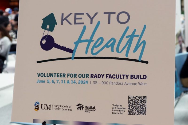 A sign promoting the "Key to Health" build project on display at the kick-off event.