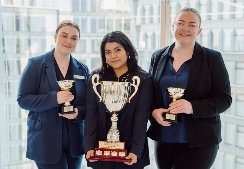 The winning team of the 2nd annual Art Braid Business Law Case Competition (left to right): Meredith Harley (2L), Maria Garcia Manzano (2L), and Moira Kennedy (2L). Photo by 47 Filmworks.