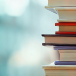 stack of books with blurry background