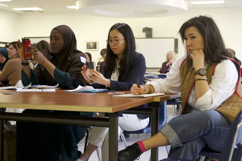 Three students in classroom