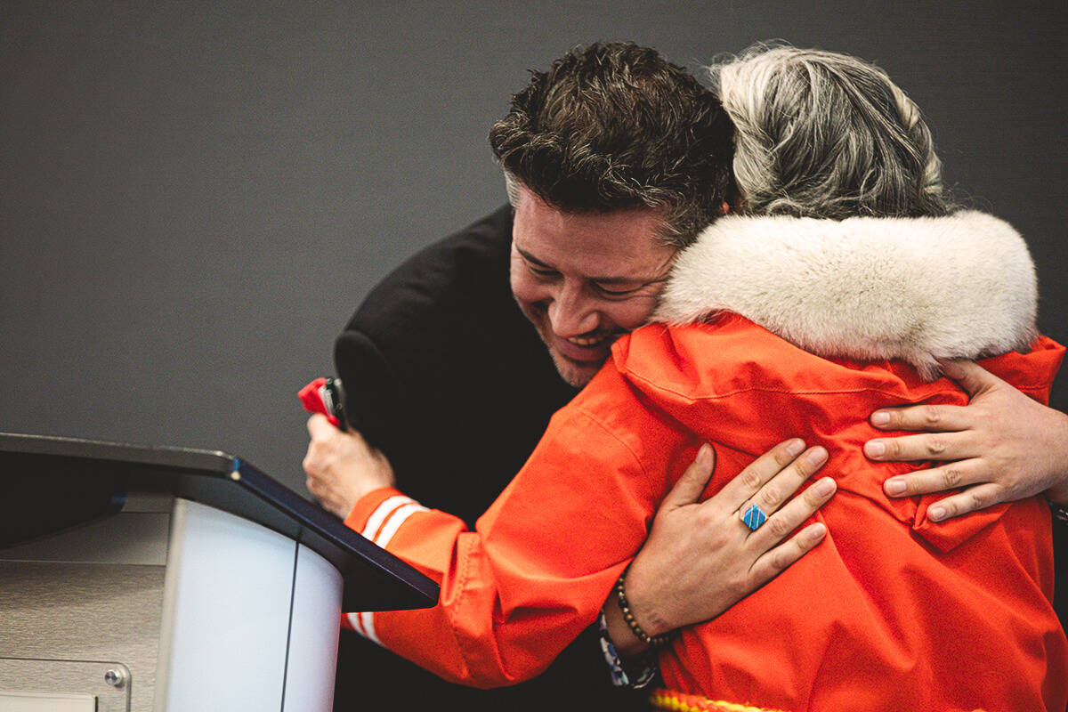 Sky Bridges of The Winnipeg Foundation hugs residential school Survivor Levinia Brown at the March 14 announcement of their gift // Photo by Mike Latschislaw