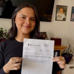 Antonina Kanidurin hold up her her entrance letter