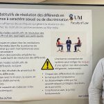 LLM 2024 graduate Joel Lebois, stands proudly beside a research poster of his Master's thesis topic, which he wrote entirely in French.