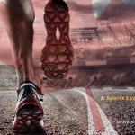 Cover graphic of Robson Rundown magazine showing athletic feet running in racing track runners.