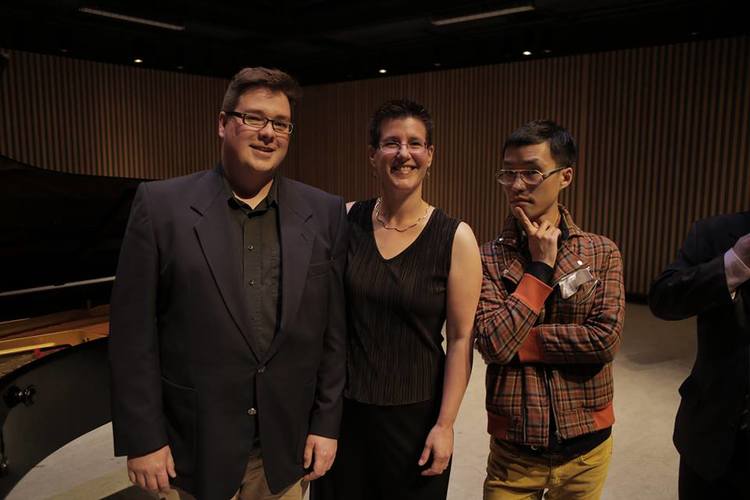 ASL Co-Founders Michael Park, Alison d'Amato, and Ray Hsu stand in a row smiling at the camera