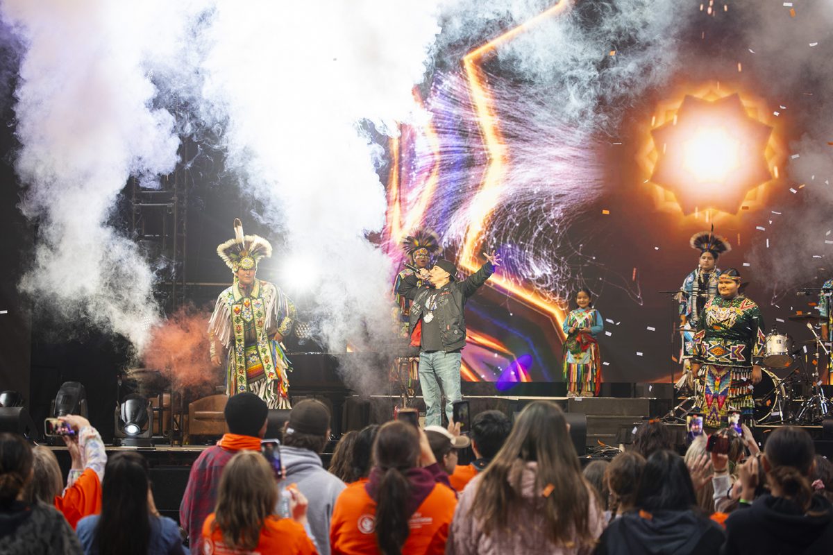 Supaman performing at Mino-pimatisiwin 2024.