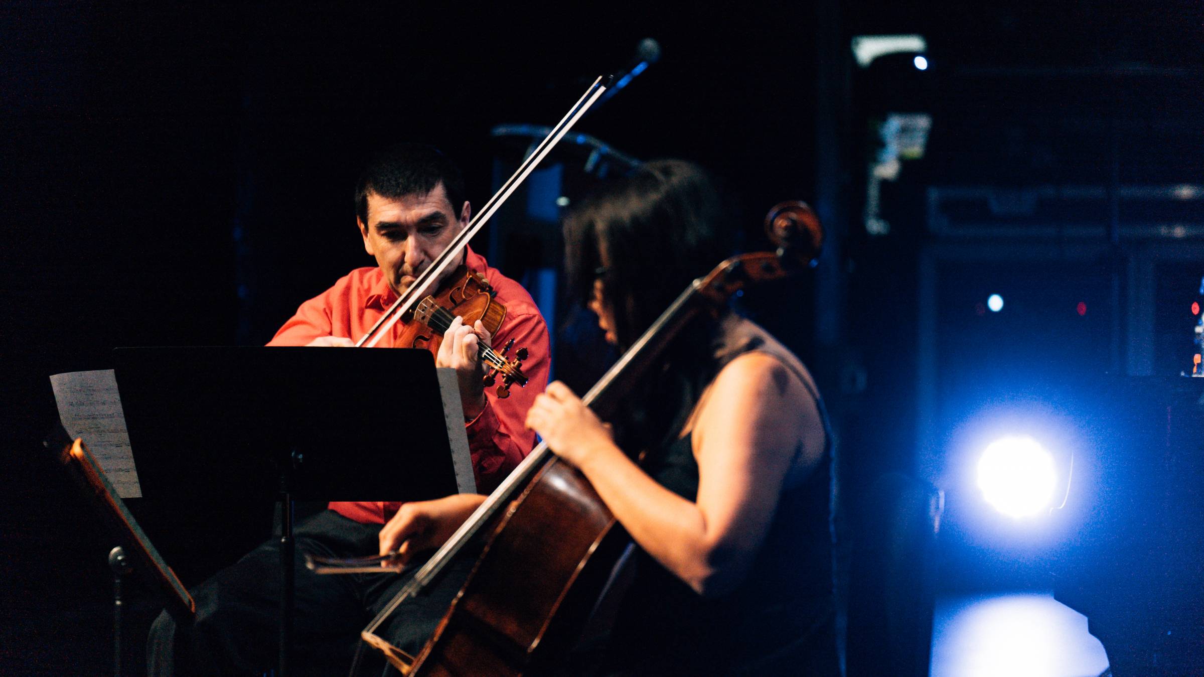 Violin professor Oleg Pokhanovski and cello associate professor Minna Rose Chung perform on opening night