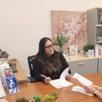 Family Resource Coordinator speaking with a client in her office