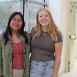 Czynara Gerard Patio and Maya Blair standing in a hallway at the College of Rehabilitation Sciences.