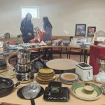 Various household items displayed on a circular table.