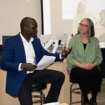 Assistant Professor Akin Ogunranti in conversation with his former PhD thesis advisor, Dr. Sara Seck. Photo by Christine Mazur.