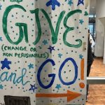 Handwritten sign for Give and Go event.