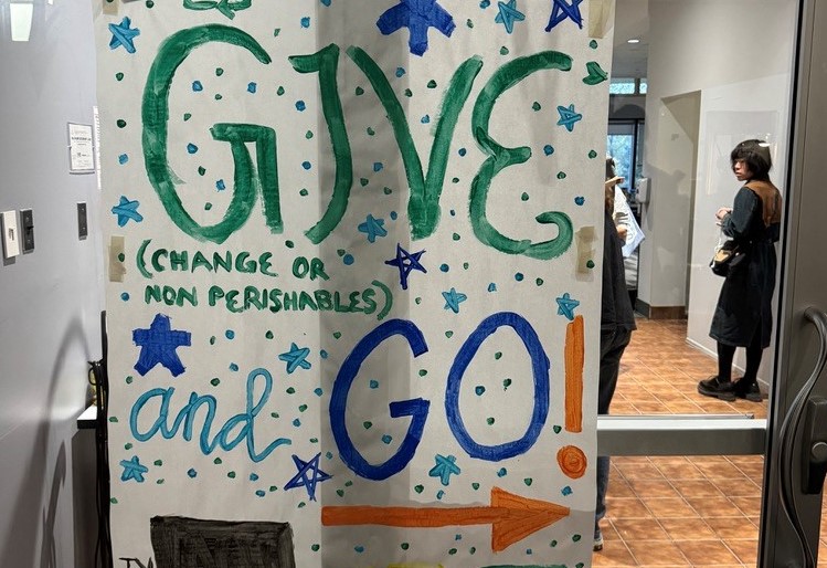 Handwritten sign for Give and Go event.