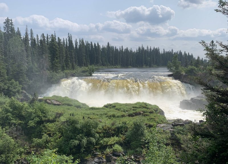 A glimpse of Pisew Falls on the Grass River, second highest waterfall in Manitoba, 74km south of Thompson. Photo by Brandon Leverick, 3L.