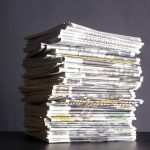 A stack of newspapers.