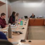 Photo of students around a boardroom table at the 2023 Grad Student Thesis Writing bootcamp