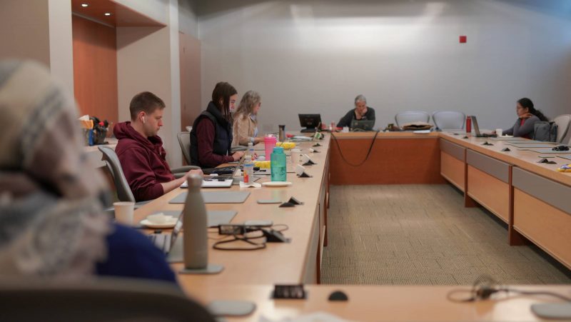 Photo of students around a boardroom table at the 2023 Grad Student Thesis Writing bootcamp