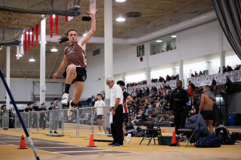 Graham Hutchison-Campbell jumping during a long jump competition