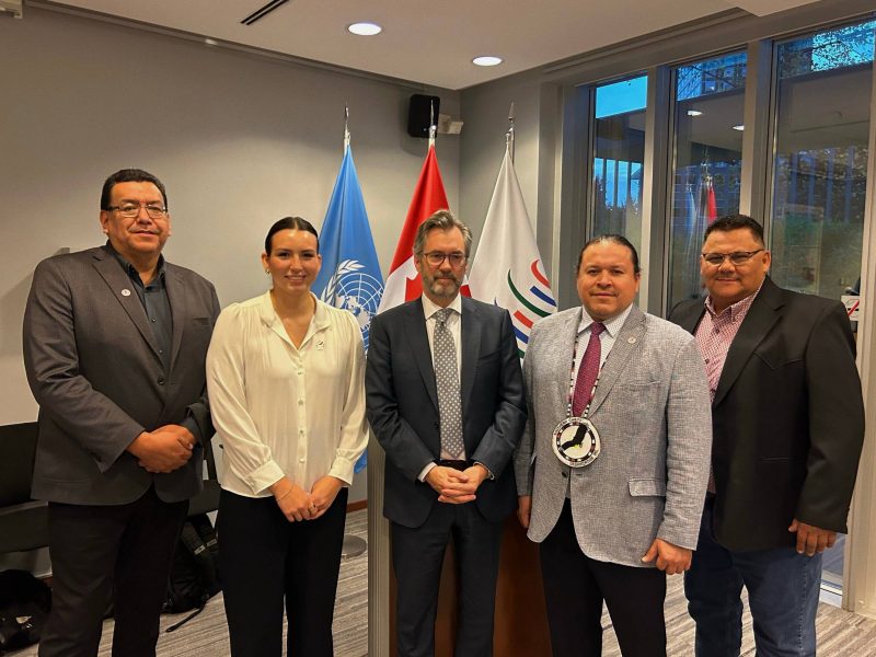 Pictured in the first image from left to right is: Chief Kurvis Anderson (Pinaymootang First Nation), Tréchelle Bunn (2L) [BA/23], Peter MacDougall (Ambassador and Permanent Representative to the UN Office in Geneva), Grand Chief Jerry Daniels [BA (Economics)/08] (Southern Chiefs' Organization Inc.), and Chief Wayne Desjarlais (Ebb and Flow First Nation).