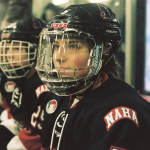 A Naha team hockey player. Photo by Alana Paterson. www.alanapaterson.com