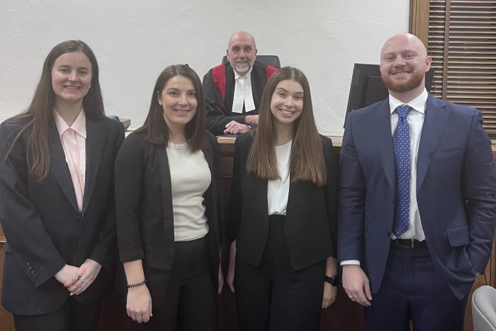 Left to right: Third-year law students Nadine Plourde, Maureen Friesen, Sydney Newman, Harlan Morris with Judge Tim Killeen (back).