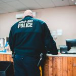 RCMP officer at a store (photo credit: Erik Mclean)