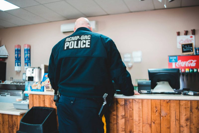 RCMP officer at a store (photo credit: Erik Mclean)