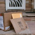 parcels sitting on a door step. (photo credit RDNE Stock project)