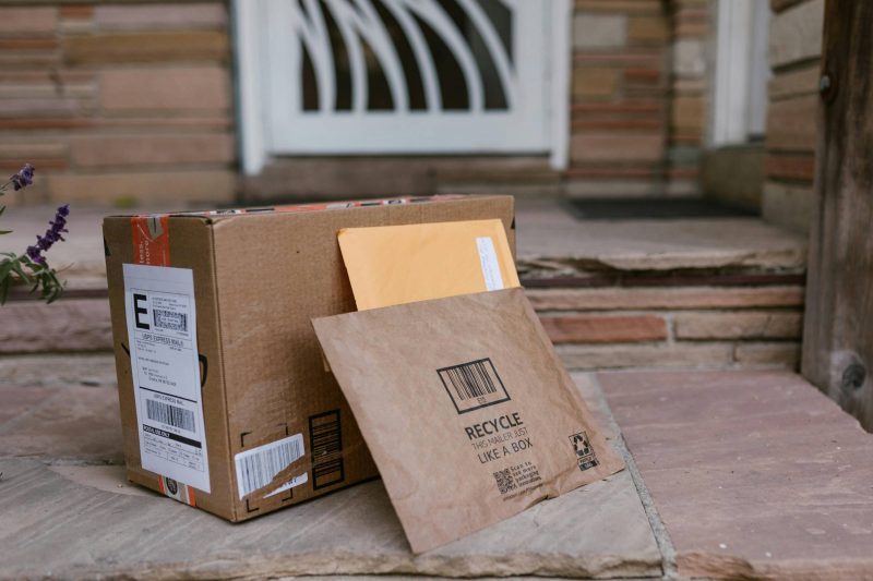 parcels sitting on a door step. (photo credit RDNE Stock project)