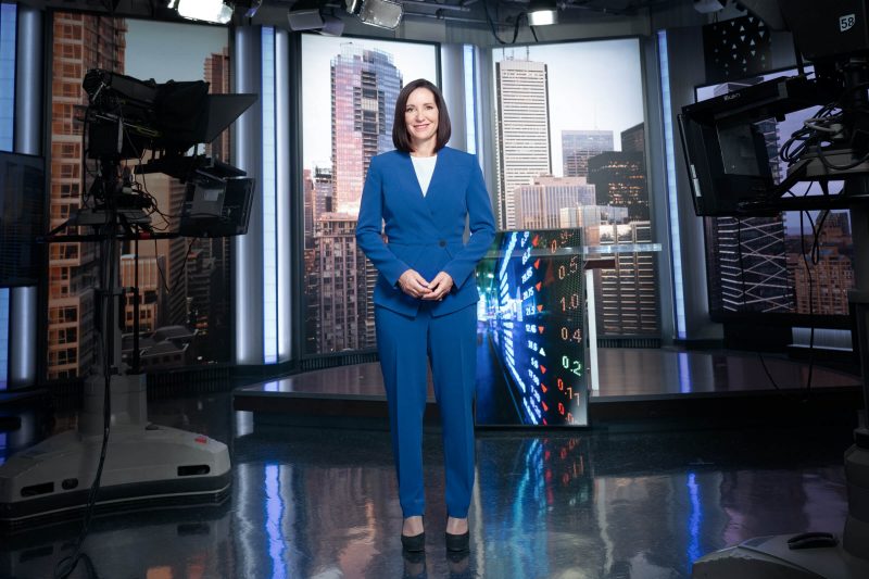 Amanda Lang standing in a broadcast studio