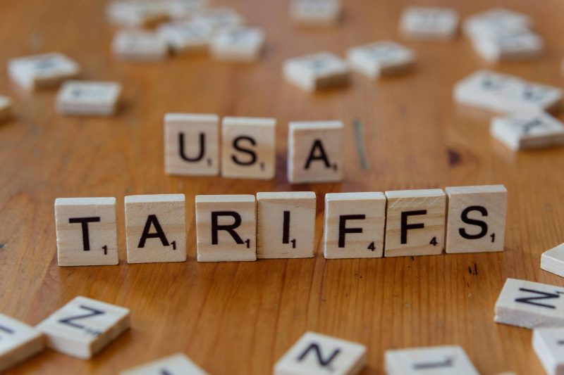 Scrabble tiles spelling out tariffs and USA. Photo credit: Markus Winkler