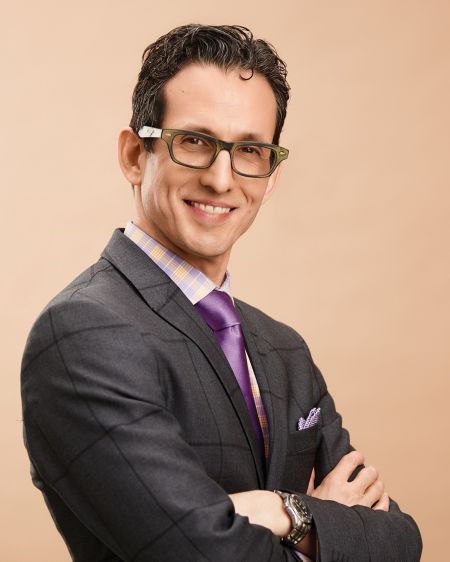 Portrait of Dr. Claudio Rigatto. 