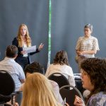 Faculty and instructors in discussion at the 2025 SoTL Symposium