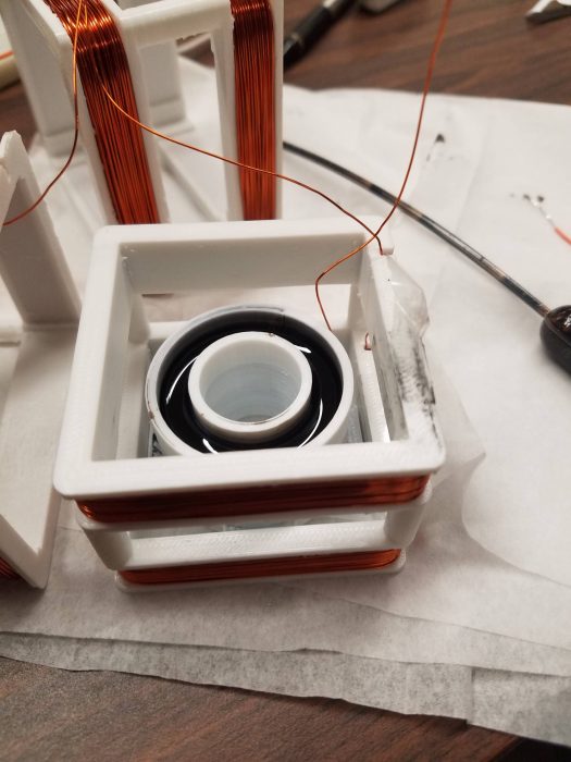 white plastic cube with magnetic water inside